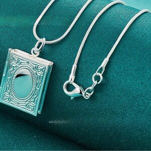 Elegant Silvertone Locket Necklace